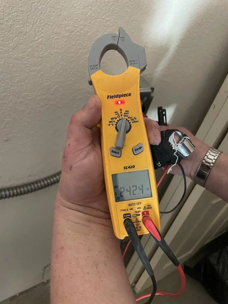 Voltage testing with clamp meter during Aluminum Wiring Replacement in Cato